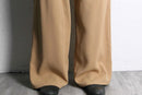 beige wide tuck slacks