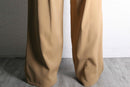 beige wide tuck slacks
