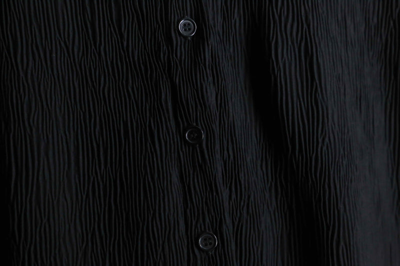 wrinkled black long black design shirt