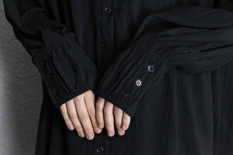 wrinkled black long black design shirt