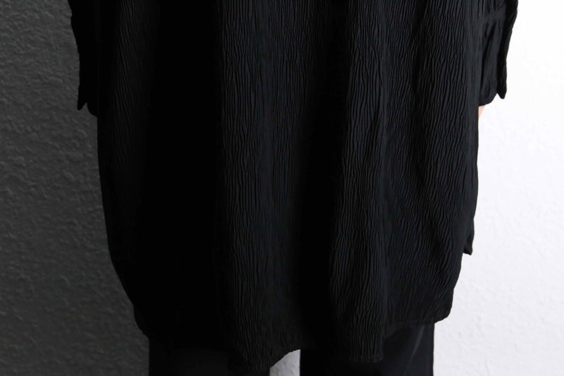 wrinkled black long black design shirt