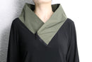asymmetrical high-neck top