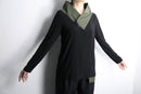 asymmetrical high-neck top