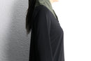 asymmetrical high-neck top