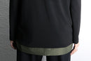 asymmetrical high-neck top