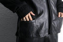 black knit × black leather switch cardigan
