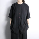 black collarless poly shirt