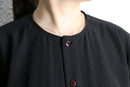 black collarless poly shirt