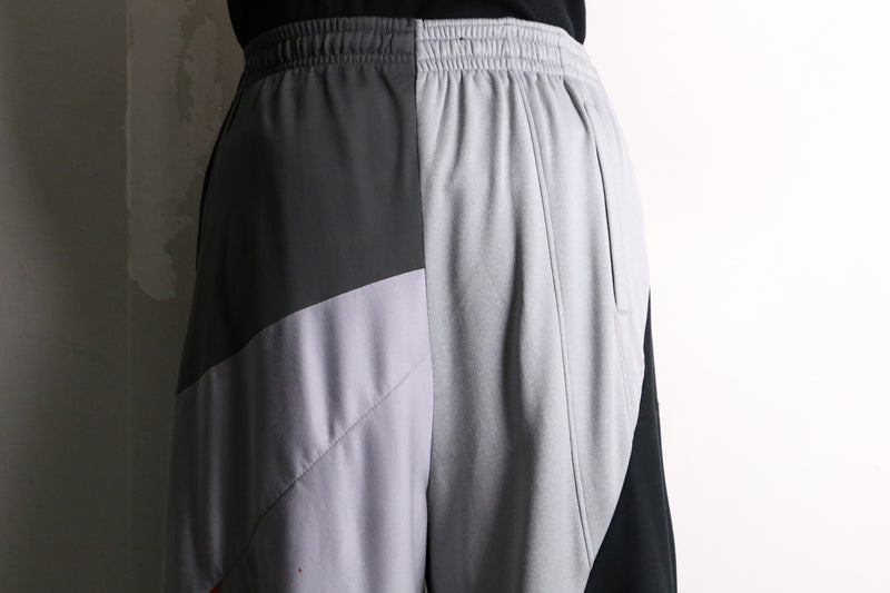 remake "再構築" navy color patchwork design track pants