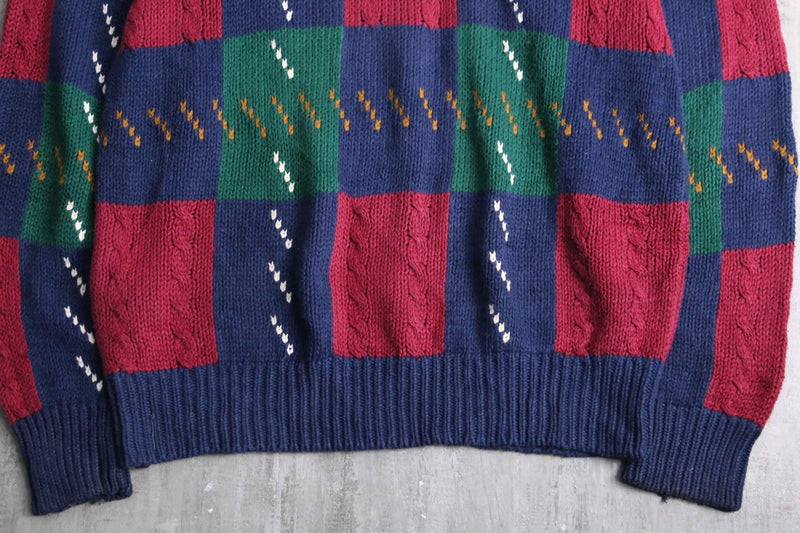 ”STJohn’sBay” block check crew neck knit