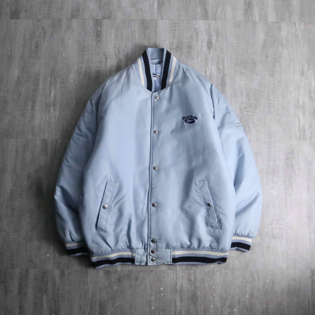 1990s Reebok nylon varsity jacket