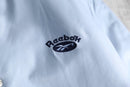 1990s Reebok nylon varsity jacket