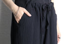 black popcorn fabric easy tapered pants