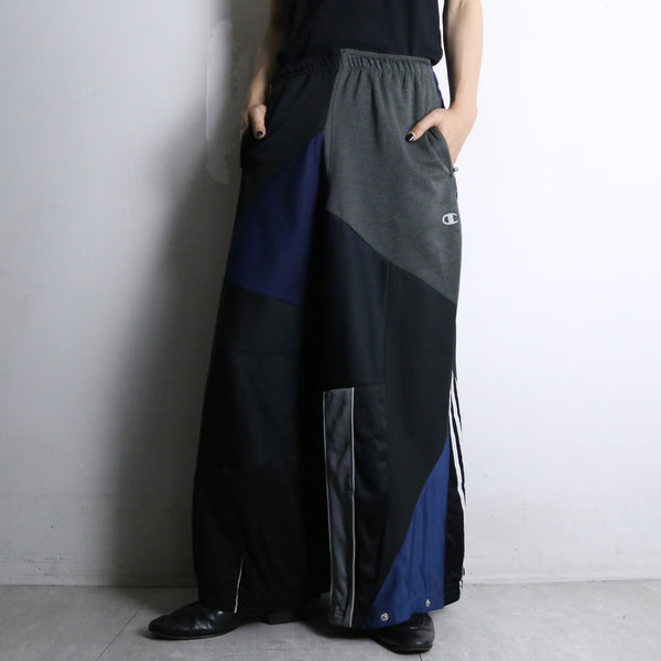 "Re:make" asymmetry docking HAKAMA track pants