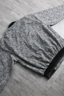 monotone total pattern blouson