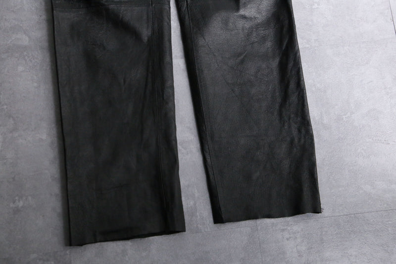 black fake leather pants