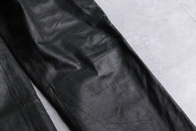 black fake leather pants