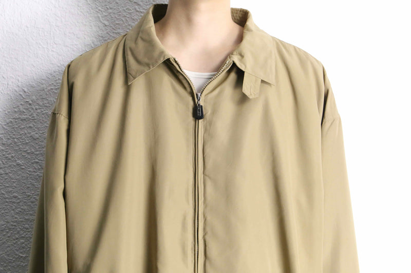 beige polyester chin strap drizzler jacket