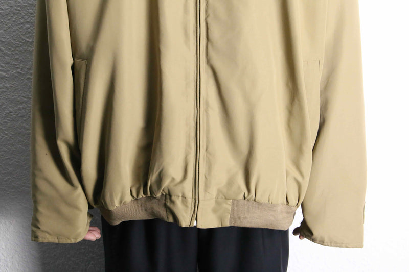 beige polyester chin strap drizzler jacket