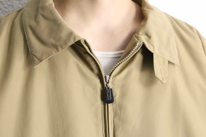beige polyester chin strap drizzler jacket