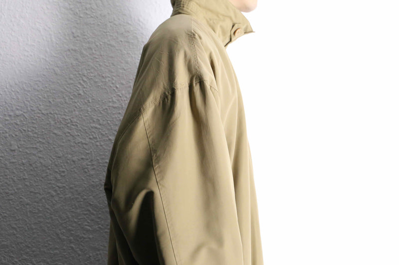 beige polyester chin strap drizzler jacket