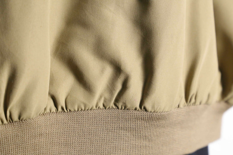 beige polyester chin strap drizzler jacket