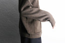 brown woven pattern knit blouson