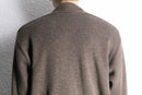brown woven pattern knit blouson