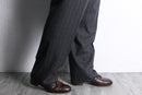 “Burberry’s” gray stripe wool trouser