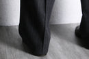 “Burberry’s” gray stripe wool trouser