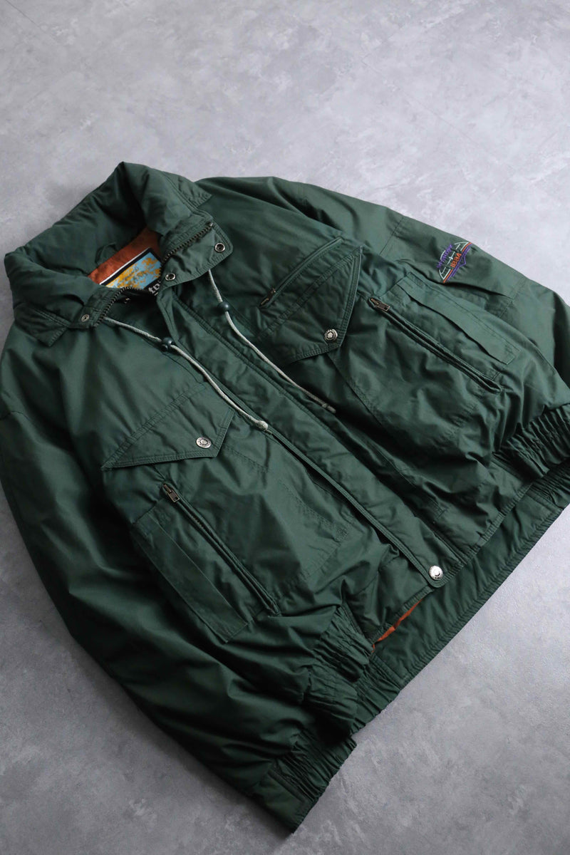 green color short length hi neck down jacket