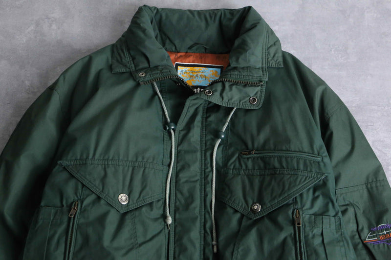 green color short length hi neck down jacket