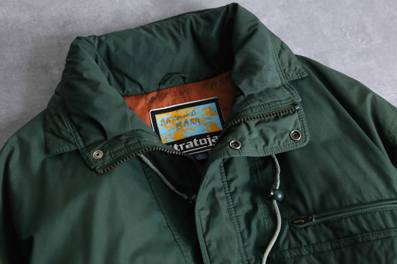 green color short length hi neck down jacket