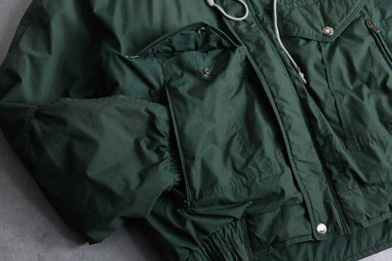 green color short length hi neck down jacket