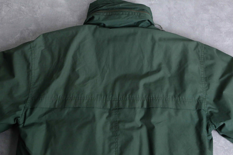 green color short length hi neck down jacket