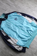“adidas” pale blue nylon track jacket