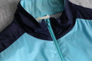 “adidas” pale blue nylon track jacket