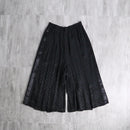 black polka dot pleated culotte shorts