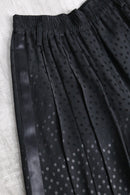 black polka dot pleated culotte shorts