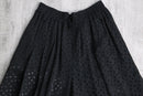 black polka dot pleated culotte shorts