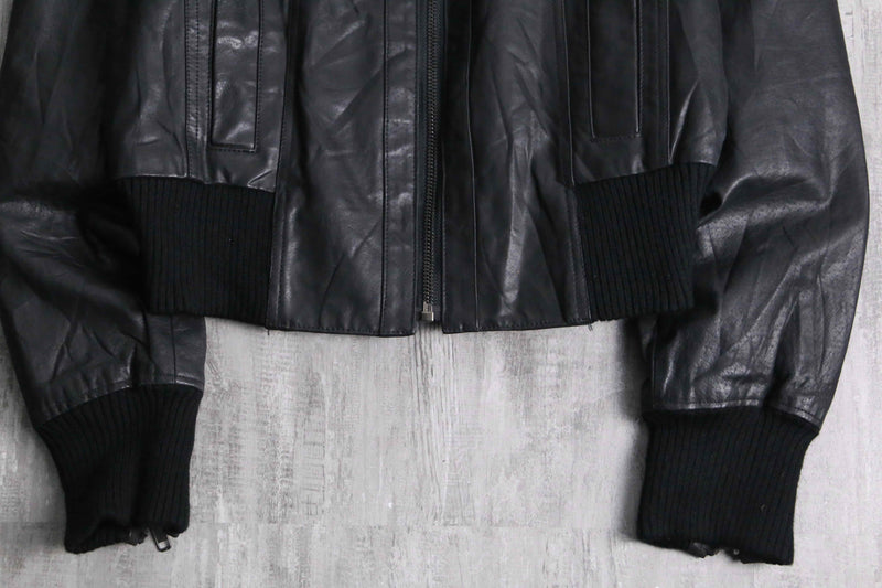 Cropped length black leather bomber jacket