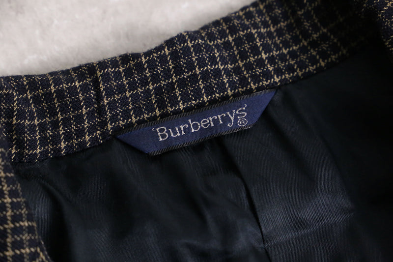 “Burberry’s” navy check pattern single tailored jacket