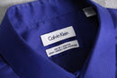 “Calvin Klein” deep blue cotton dress shirt