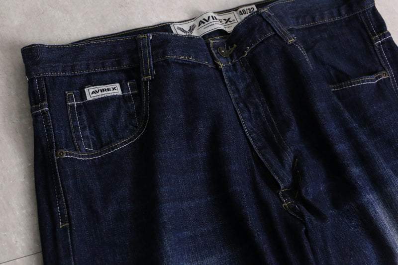 “AVIREX” dark indigo fade buggy denim pants