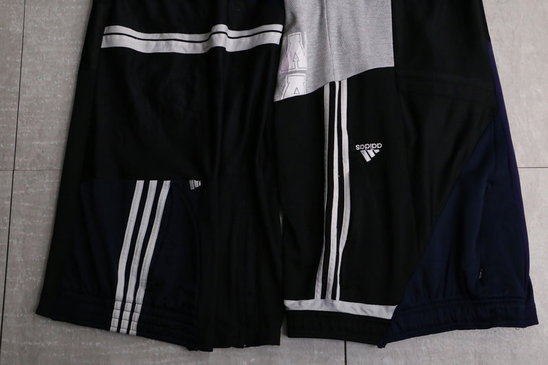 "Re:make" asymmetry docking HAKAMA track pants