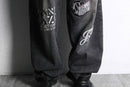 fade black multi design baggy denim pants