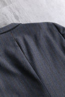 ”Yves Saint Laurent” light gray double breasted tailored jacket.