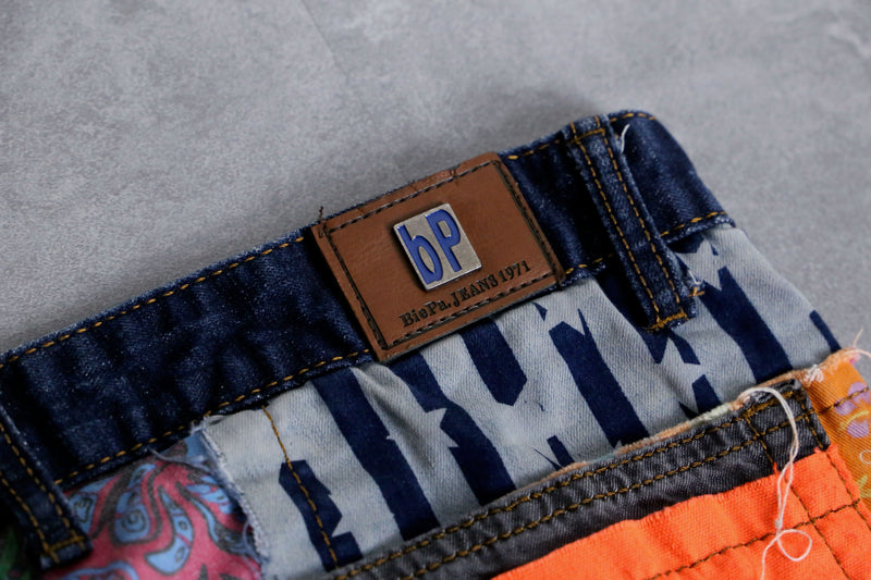 many patchwork design straight denim pants