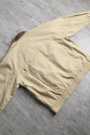 beige leather collar multi pocket blouson