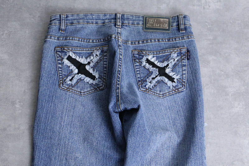 "X" damage fringes flare denim